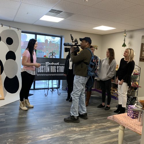 Bockrath Flooring team speaking to a film crew