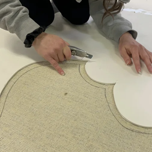 Cutting a custom rug at Bockrath Flooring & Rugs