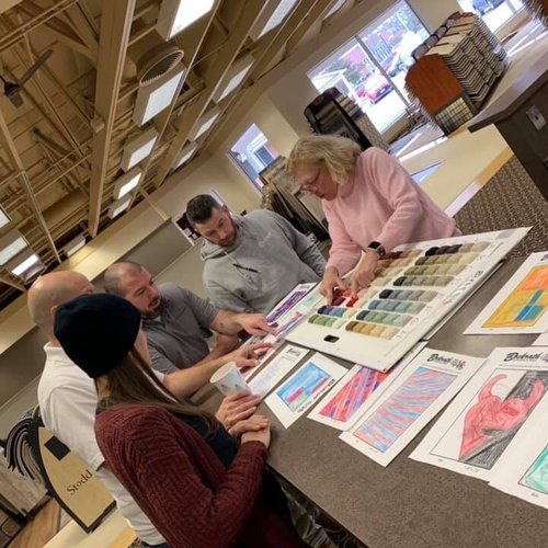 Bockrath Flooring team with 2020 Rug Design Contest Participants