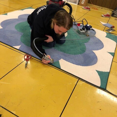 Custom flower rug design in Dayton OH by Bockrath Flooring & Rugs