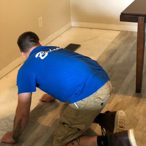 Flooring installers in a Dayton OH home