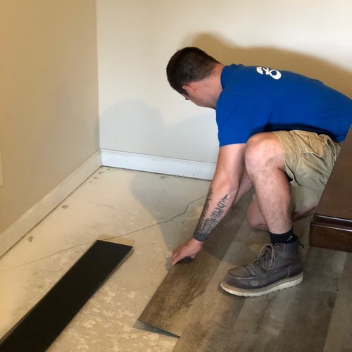 Flooring installers in a Dayton OH home