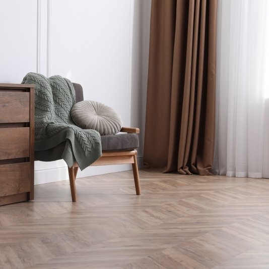 Seating area in a Dayton OH home with herringbone flooring