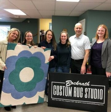 Bockrath Flooring & Rugs Team with Rug Contest Design Winner